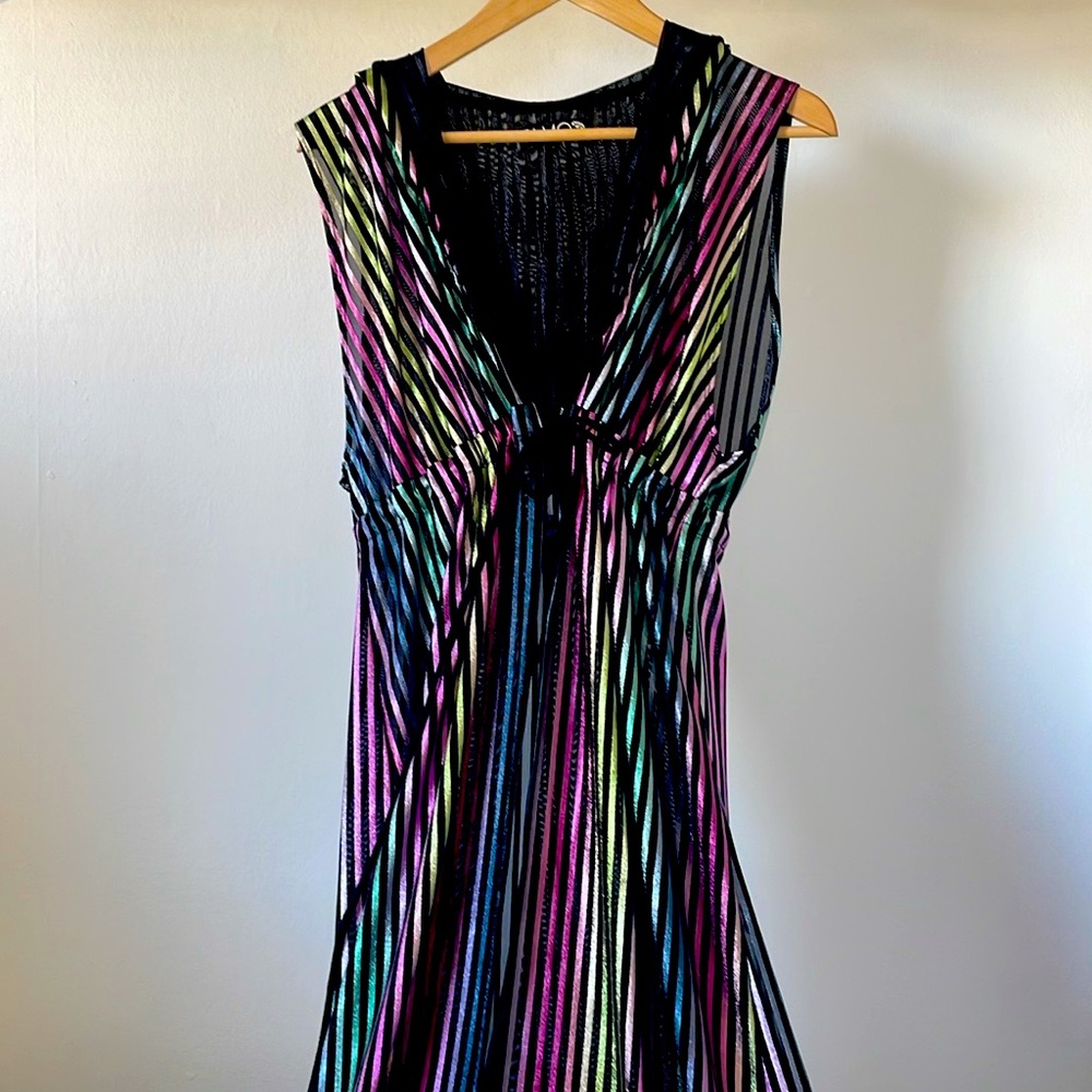 Sleeveless festival wrap with hood